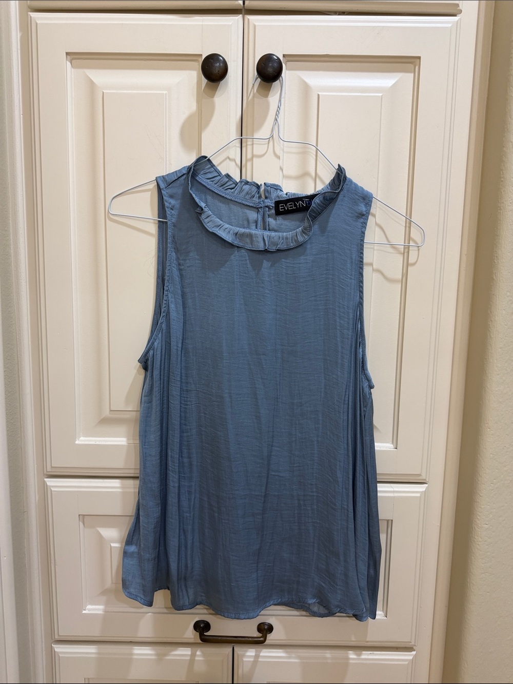 Sleeveless Ruffle-Neck Blouse in Slate Blue